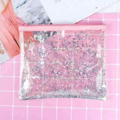 Viaje transparente de lujo logotipo personalizado impermeable PVC claro maquillaje cosmético brillo bolsa TPU bolsa de cosméticos con cremallera rosa